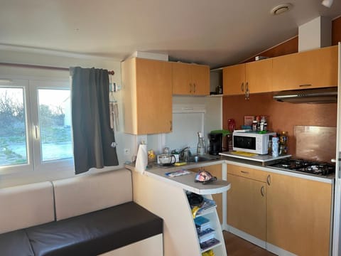 Kitchen or kitchenette, stove