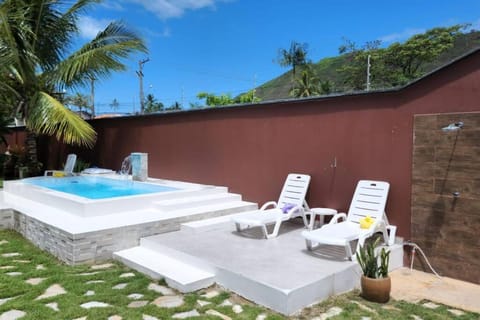 Casa a 100m da praia, com piscina, churrasqueira, área de lazer House in São Sebastião