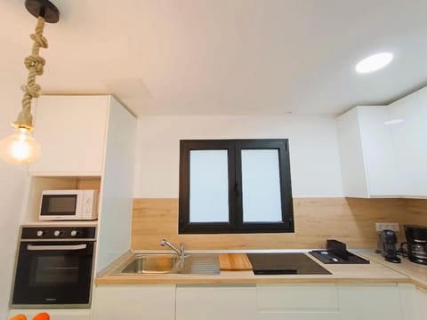 Kitchen or kitchenette, stove, kitchen