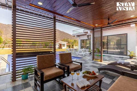 StayVista's Bella Dream - Mountain-View Villa with Outdoor Pool, Lawn featuring a Gazebo & Indoor Games Villa in Gujarat