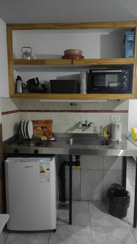 Kitchen or kitchenette, oven, stove