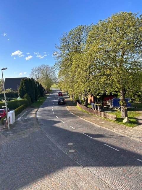 Property building, Spring, Day, Neighbourhood, Natural landscape, View (from property/room), Street view, Parking