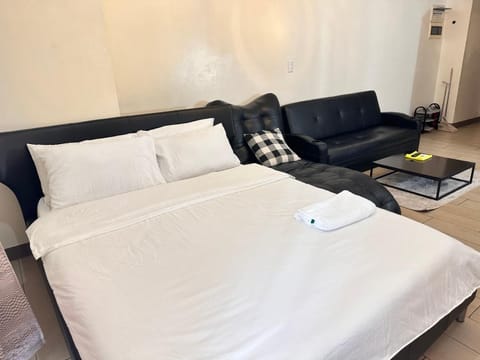 Deluxe Suite at Venice Grand Canal Aparthotel in Makati