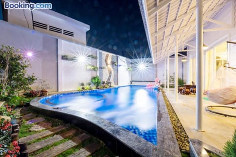 Property building, Night, Pool view, Swimming pool, sunbed