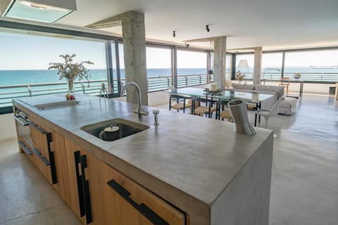 Kitchen or kitchenette, Living room, Dining area, Sea view