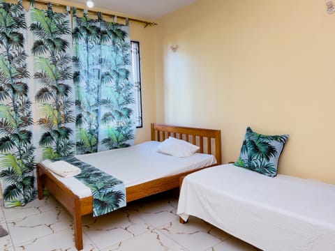 MOP Nyali beach ensuite rooms inside apartment with pool Condo in Mombasa
