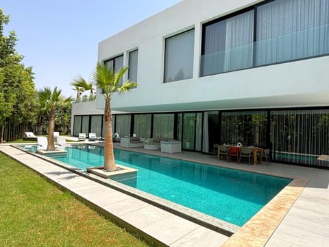 Property building, Patio, Day, Garden, Garden view, Pool view, Swimming pool, sunbed