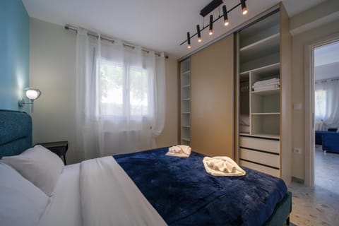 Bed, Photo of the whole room, Bedroom, bunk bed, towels, wardrobe, air conditioner