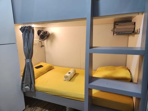 Sinhassan dormitory hostel Juhu Hostel in Mumbai