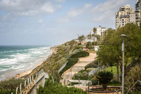 Seaside Escape with Private Patio by Sea N' Rent Apartment in Netanya