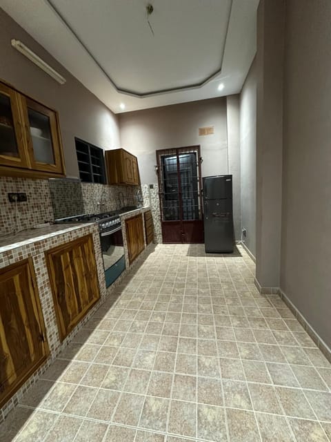 Kitchen or kitchenette, oven, stove