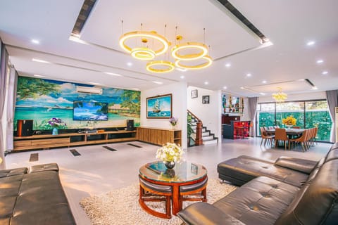 Living room, Seating area, Pool view