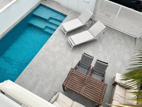 Seating area, Pool view, Swimming pool, sunbed