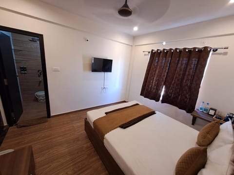 Meadows Inn Hotel in Mysuru