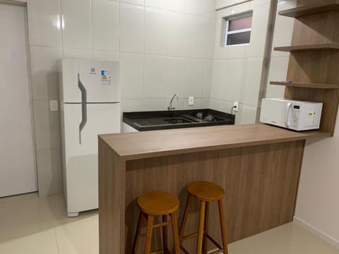 Kitchen or kitchenette, oven, stove