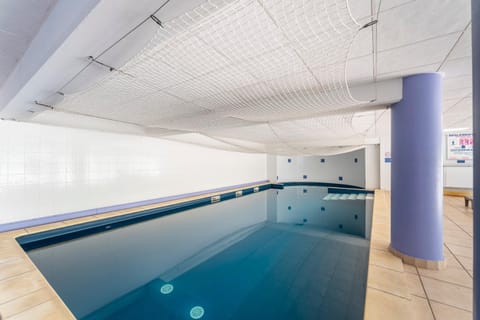 Property building, Living room, Swimming pool