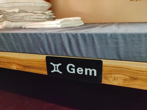 Bed, Property logo or sign, Bedroom