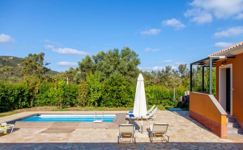 Patio, Day, Pool view, sunbed