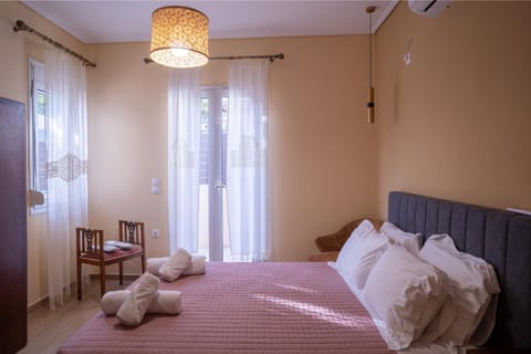 Bed, Photo of the whole room, Bedroom, towels, air conditioner