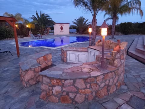 Night, BBQ facilities, Pool view, Swimming pool