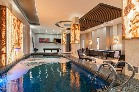 Living room, Seating area, Pool view, Swimming pool, sunbed