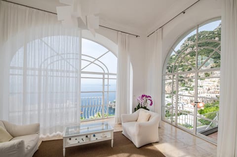 Natural landscape, View (from property/room), Living room, Seating area, Sea view