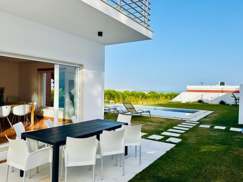 Patio, Day, Garden, Garden, View (from property/room), Dining area, Pool view, Swimming pool