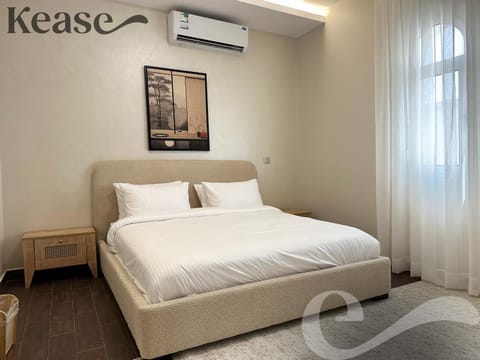 Property building, Bed, Photo of the whole room, Bedroom, Text overlay, air conditioner