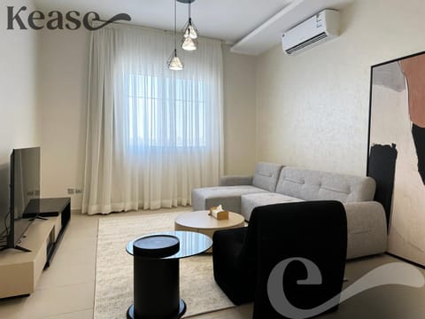 TV and multimedia, Living room, Seating area, fireplace, air conditioner