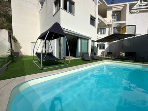 Property building, Pool view, Swimming pool, sunbed