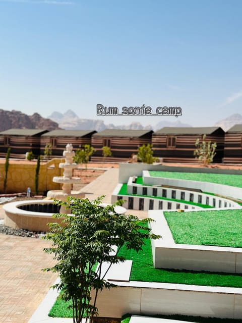 Nearby landmark, Day, Natural landscape, Text overlay, Mountain view, Pool view