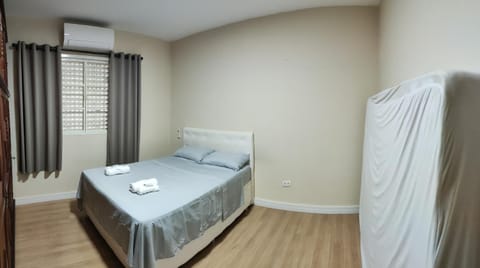 Bed, Photo of the whole room, Bedroom, towels, air conditioner