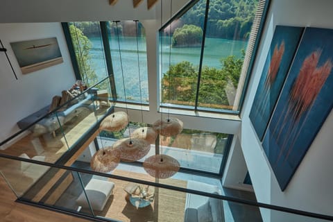 Natural landscape, View (from property/room), Living room, Seating area, Lake view