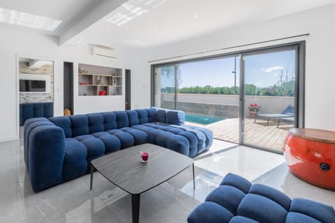 Living room, Seating area, Pool view