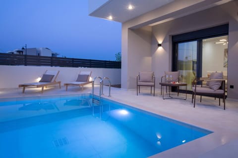 Patio, Night, Natural landscape, Balcony/Terrace, Living room, Seating area, Pool view, Swimming pool, sunbed