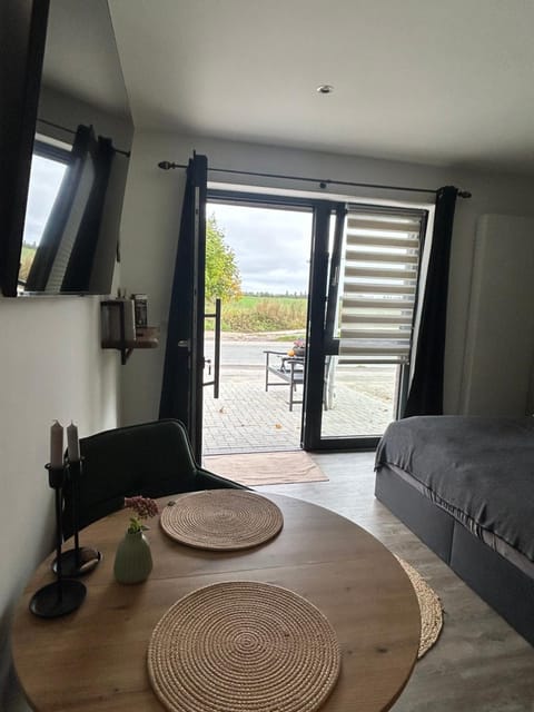 View (from property/room), Balcony/Terrace, Living room, Seating area, Bedroom