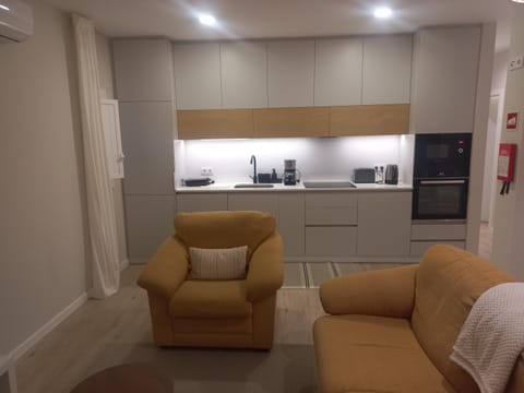 Kitchen or kitchenette, Living room, oven, stove, air conditioner