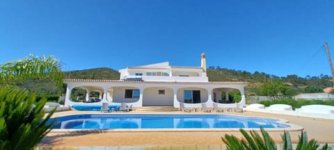 Property building, Pool view, Swimming pool, sunbed