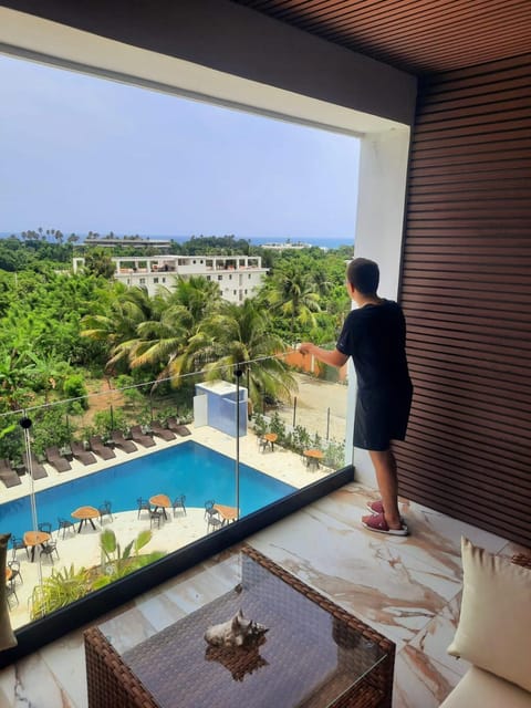 View (from property/room), Balcony/Terrace, Pool view, Sea view, Swimming pool
