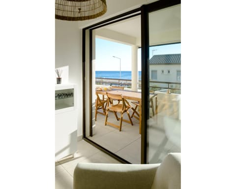 View (from property/room), Living room, Seating area, Sea view