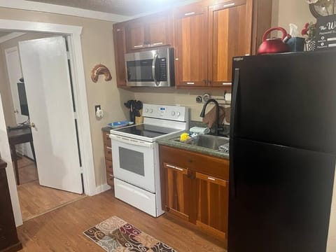 Kitchen or kitchenette, oven, stove