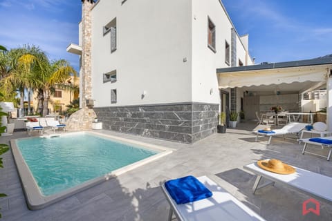 Property building, Pool view, Swimming pool, sunbed