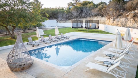 Patio, Day, Natural landscape, Garden, Pool view, Swimming pool, sunbed