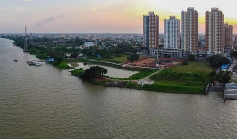 Property building, Natural landscape, Bird's eye view, City view, River view, Sunrise