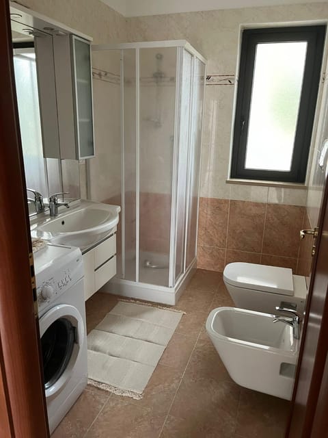 Bathroom, bidet, washing machine