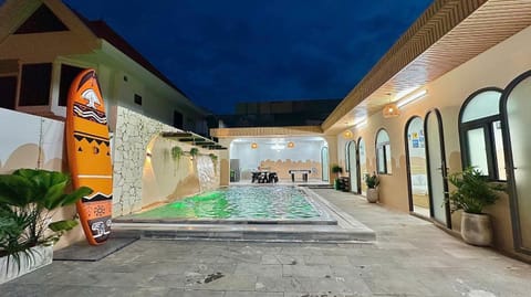 Property building, Patio, Night, Pool view, Swimming pool