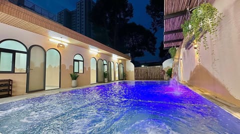 Property building, Night, Pool view, Swimming pool