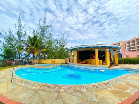 Property building, Day, Beach, Pool view, Swimming pool, sunbed