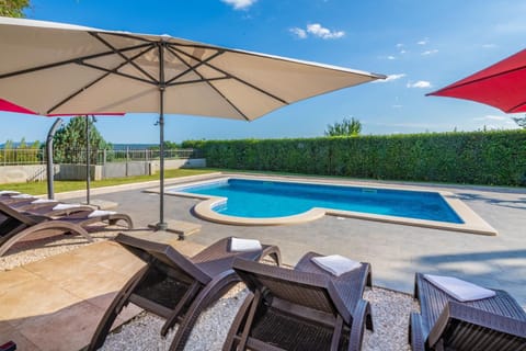 Patio, Day, Pool view, Swimming pool, sunbed