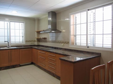 Kitchen or kitchenette, stove